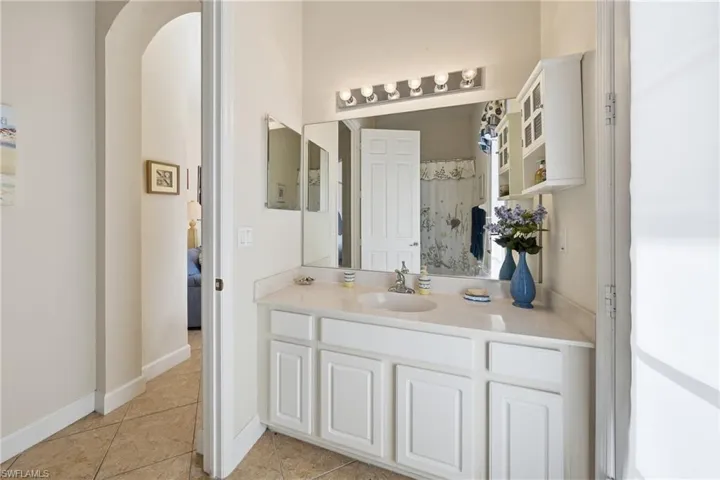 Guest bathroom with convenient access to the bedrooms and direct entry to the courtyard