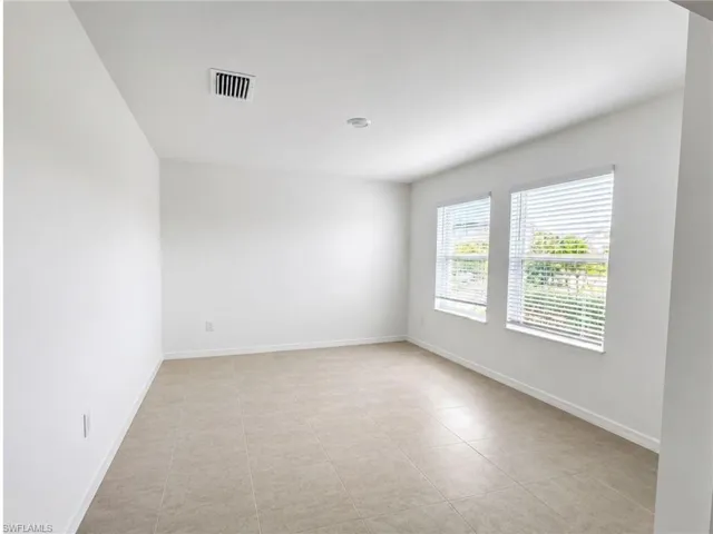 Versatile bonus room ideal for a media room, playroom, or home office.