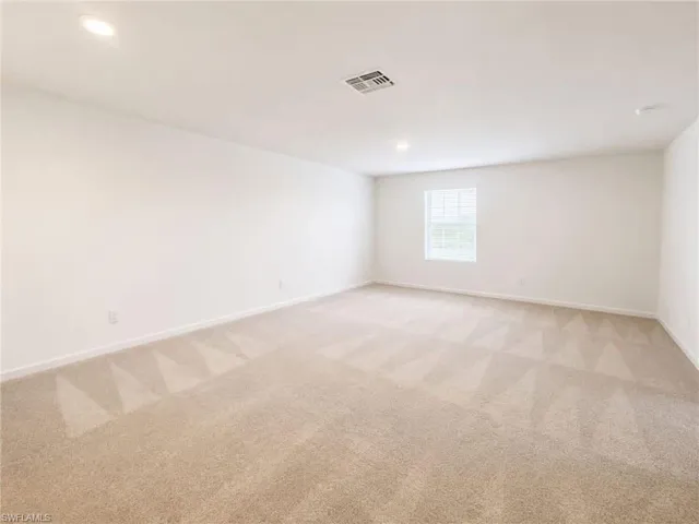 Spacious second-floor family room offering additional living space.