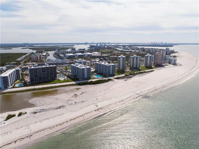 View of urban area featuring expansive beach