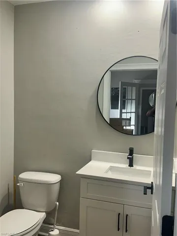 Bathroom with vanity and toilet