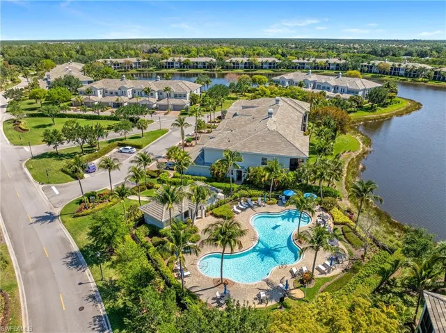 Aerial view of a large body of water and a pool area