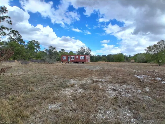 View of yard featuring a view of rural / pastoral area