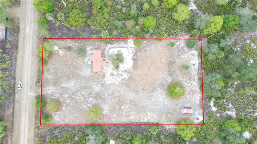 Aerial overview of property's location featuring property boundaries highlighted