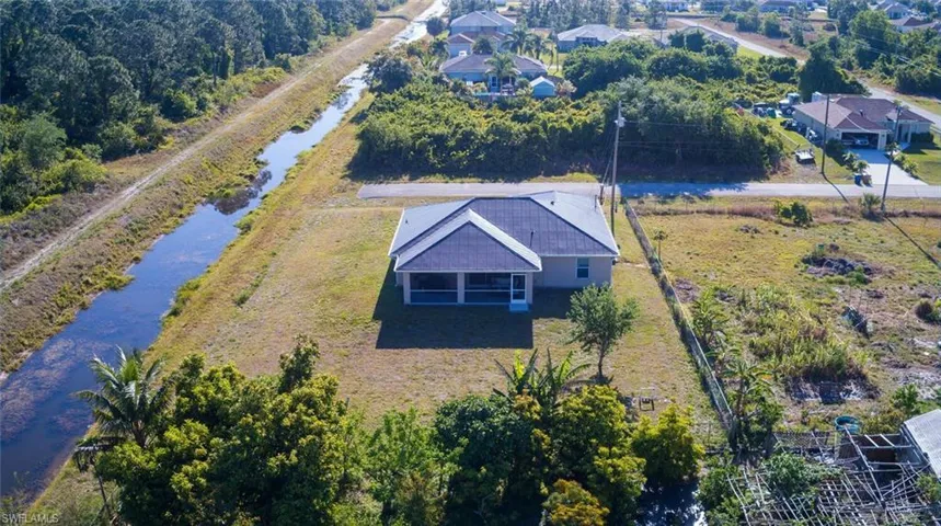 on a spacious quarter-acre lot with a western-facing lanai!