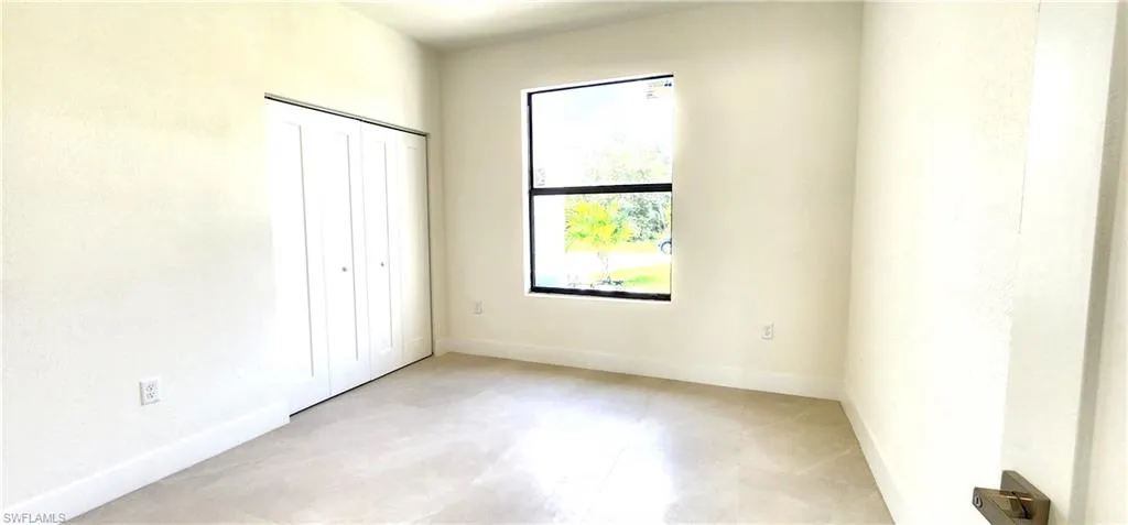 View of tiled spare room