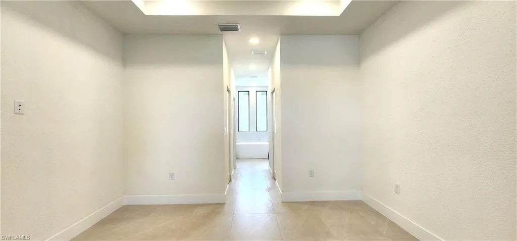 View of tiled spare room