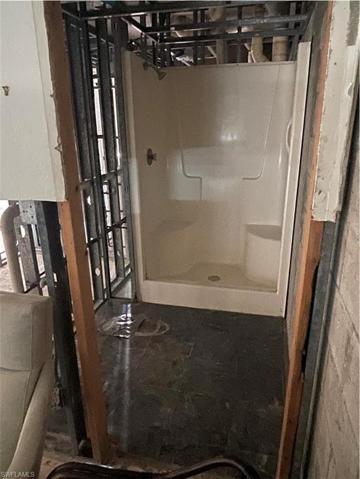 Owner's ensuite full bath with walk-in shower