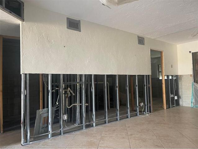 Living Room and Owner's suite & bath on otherside of wall.