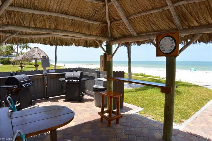 Beachside tiki hut with BBQ area where you can stay in the shade with a cool drink and great view! *Photo Pre Sept 2022