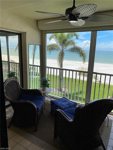 PRE HURRICANE IAN View from Screened lanai overlooking SW direct views of the beautiful manicured lawn, gulf and beach front.
