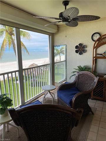 Screened lanai overlooking NW direct views of well maintained landscape, gulf and beach front.*Photo Pre Sept 2022