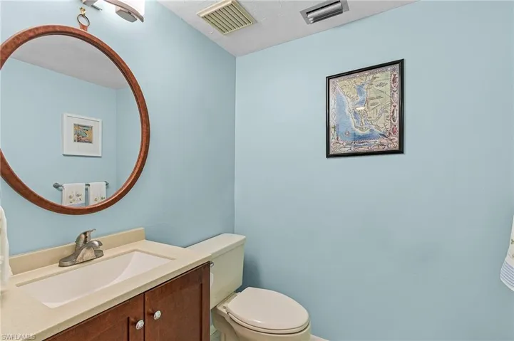 Half bathroom off front entryway