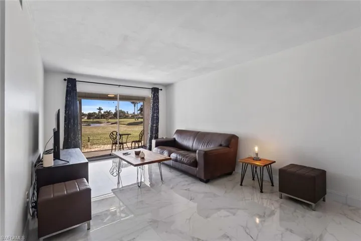 Living room with marble finish floors