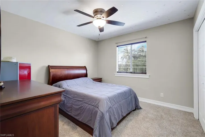 Neutral wall tones complemented by light-toned carpeting