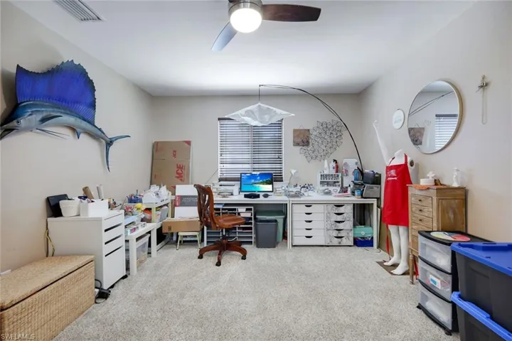 Recessed lighting, ceiling fan, and carpet flooring
