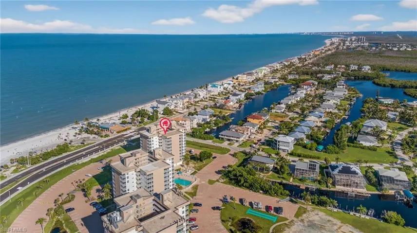 Aerial overview of property's location featuring a nearby body of water