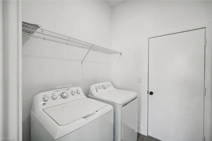 Clothes washing area with separate washer and dryer