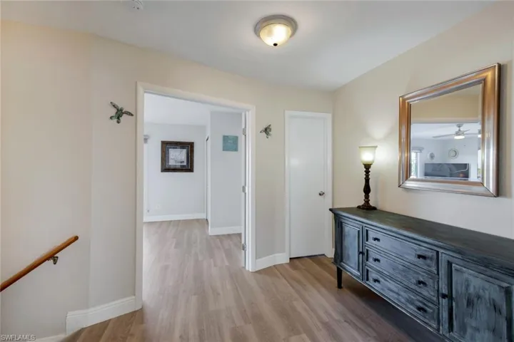 Hall with room for computer or cabinets for storage