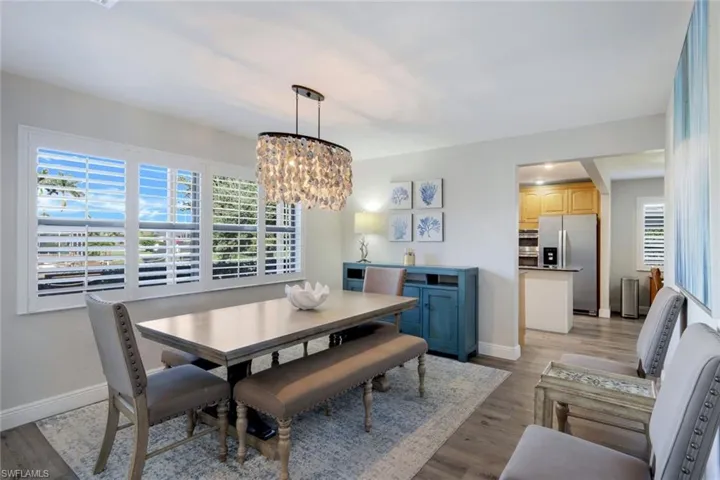 Dining room featuring gorgeous real oyster shell chandelier