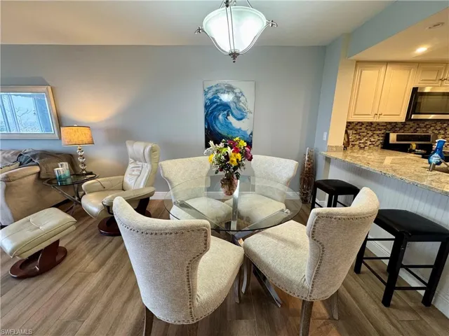 Dining area featuring light hardwood / wood-style floors