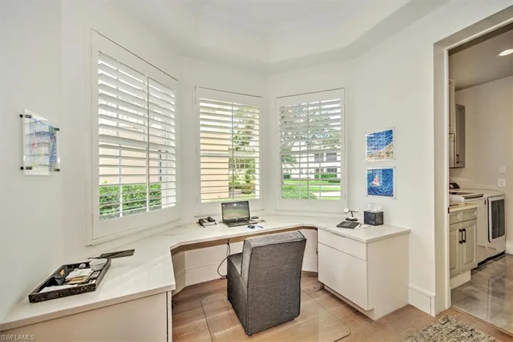 built in desk off of kitchen w/natural light