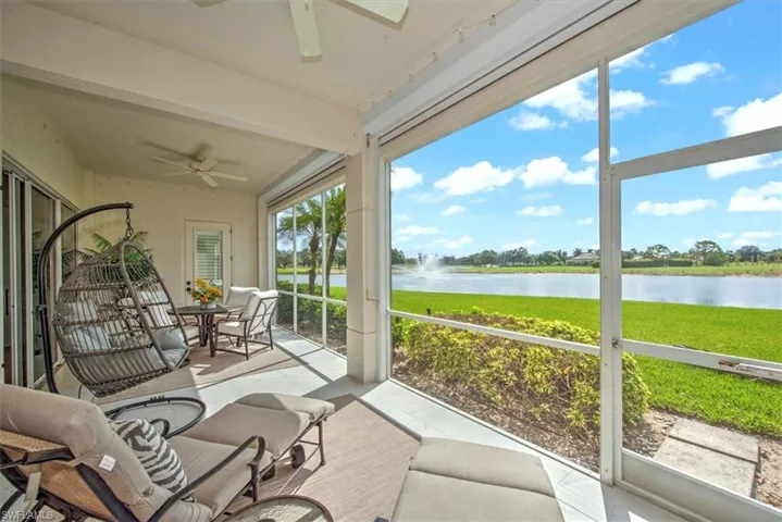 Sunroom / screened lanai with water view