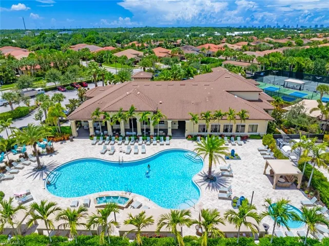 Community pool featuring a patio