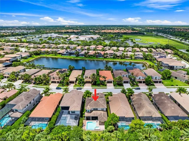 Aerial view of residential area with a nearby body of water