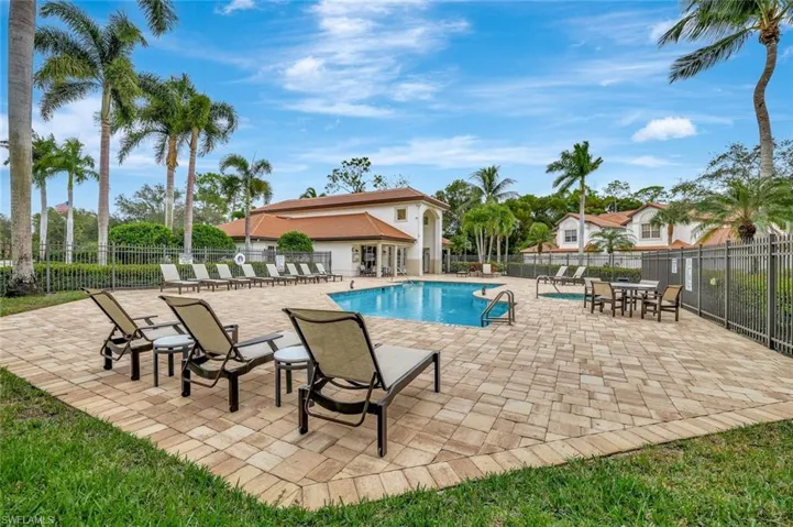 Community pool featuring a patio area
