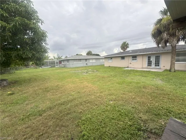 View of fenced backyard