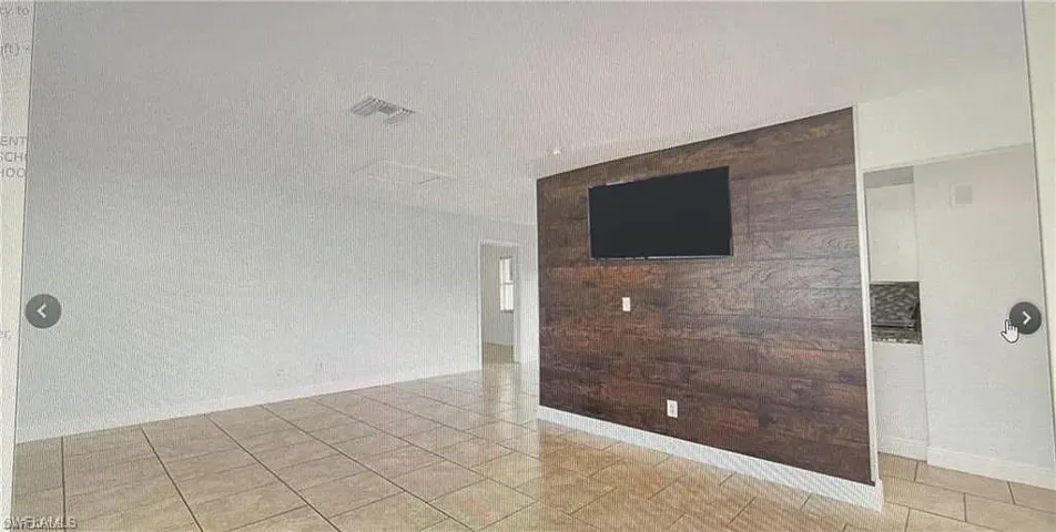 Spare room featuring visible vents