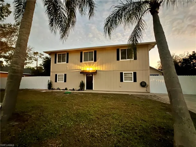 8430 Wren Rd. View of front of house with a yard and a patio