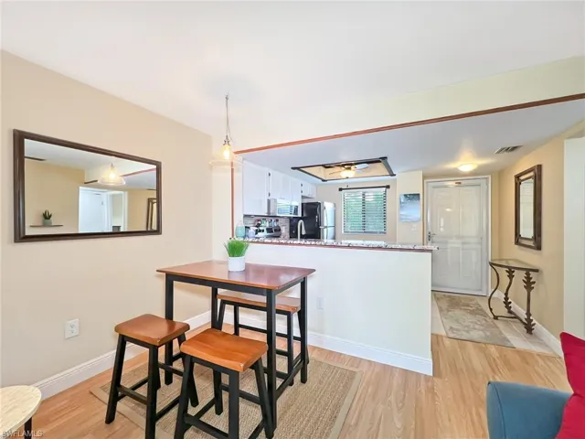 Dining area featuring light hardwood / wood-style flooring