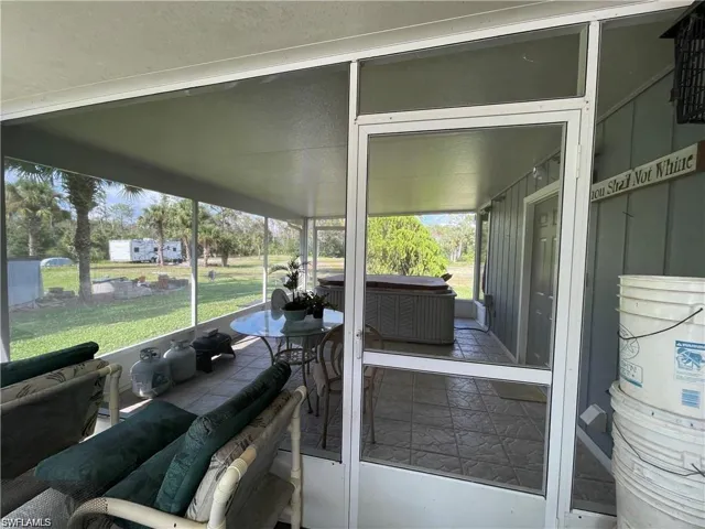 Sunroom featuring healthy amount of natural light