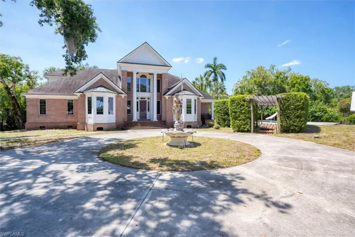 Circular Driveway, Fountain and Breezeway
