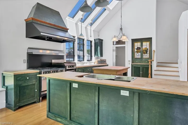 Kitchen Island Commercial Stove, Flat Top Grill, Hood, Pantry & Hidden Stairway to the Upstairs