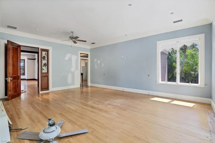 Wood and Stained-Glass Entry to Master Bedroom