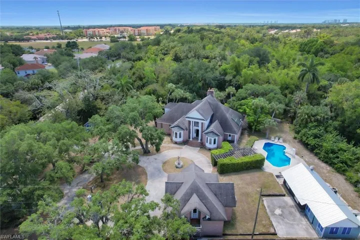Hidden Gem Surrounded by Mature Landscaping and the Serene Estero River