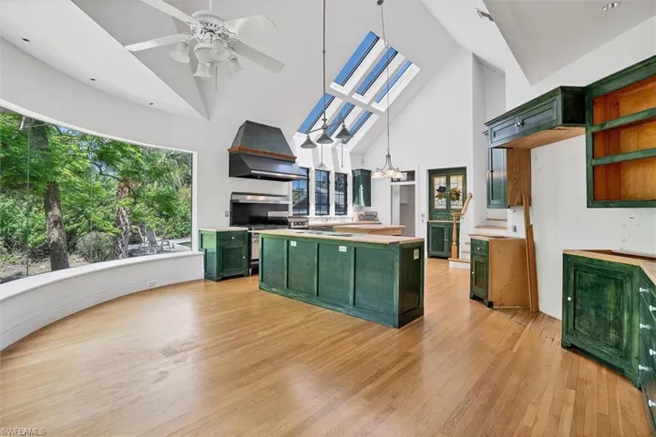 Kitchen Features Skylights, Island w/ Kitchen Sink, Prep Table and Pantry with Stained Glass Windows