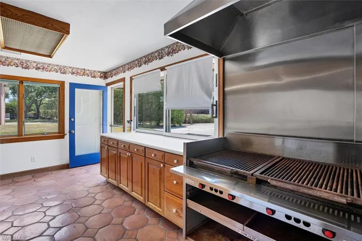 Pool House Kitchen also offers Refridgerator, Sink, Pass through Window & Bathroom