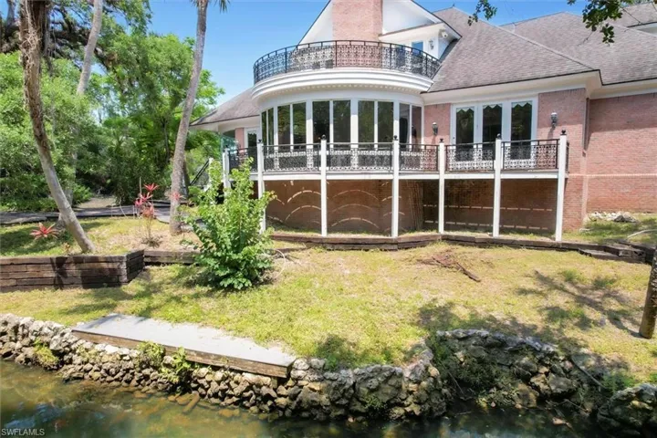 Back of the Home shows Upper and Lower Balcony's