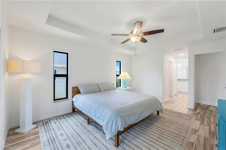 View of primary bedroom from lanai door.