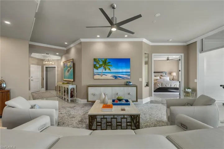 Surrounding community with a water view and a yard