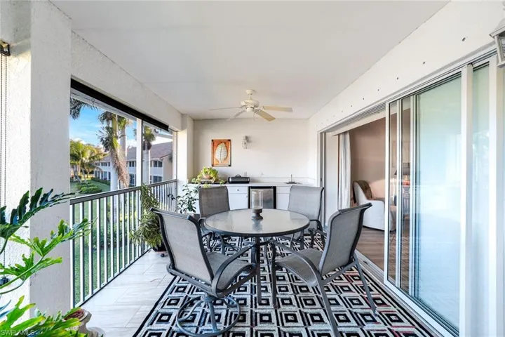 Sunroom featuring a sink