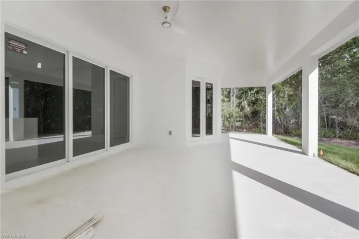 View of patio featuring ceiling fan