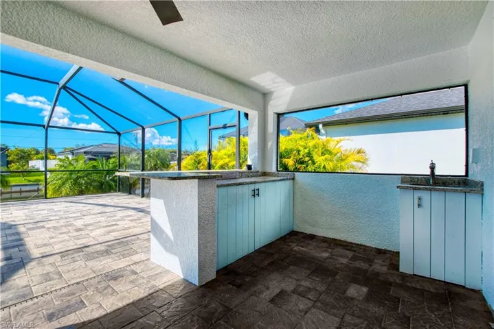 View of patio / terrace with a sunroom and glass enclosure