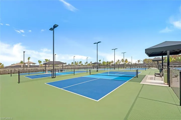 View of sport court featuring basketball hoop