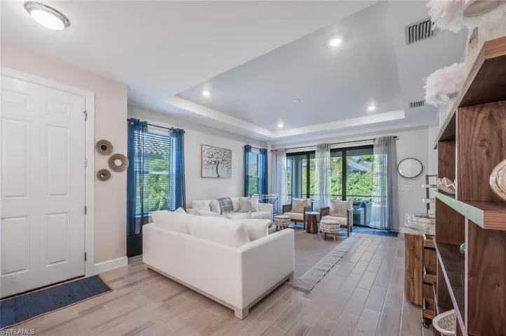 Living room with a raised ceiling