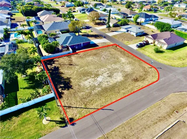 Aerial perspective of suburban area with property boundaries highlighted